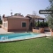 En Buger, piscina y jardines