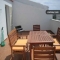 Terraza con muebles y barbacoa
